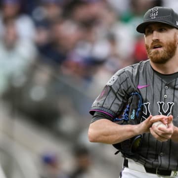 Jun 29, 2024; New York City, New York, USA; New York Mets pitcher Reed Garrett (75) reacts during the eighth inning against the Houston Astros at Citi Field. Mandatory Credit: John Jones-USA TODAY Sports