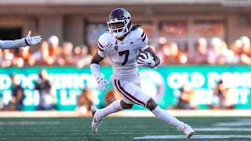 Sep 28, 2024; Austin, Texas, USA;  Mississippi State Bulldogs wide receiver Mario Craver (7) runs the ball in the second half against the Texas Longhorns at Darrell K Royal-Texas Memorial Stadium. Mandatory Credit: Daniel Dunn-Imagn Images