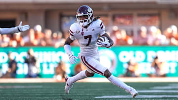 Sep 28, 2024; Austin, Texas, USA;  Mississippi State Bulldogs wide receiver Mario Craver (7) runs the ball in the second half against the Texas Longhorns at Darrell K Royal-Texas Memorial Stadium. Mandatory Credit: Daniel Dunn-Imagn Images