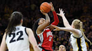 Ohio State Buckeyes forward Cotie McMahon (32) shoots over Iowa Hawkeyes guard Kylie Feuerbach (4) as Caitlin Clark (22) looks on during the second half at Carver-Hawkeye Arena.