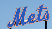 The New York Mets logo stands in center field before the game against the Washington Nationals at Clover Park in Port St. Lucie, Fla., in March 2022.