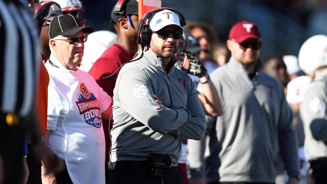 Dec 23, 2023; Birmingham, AL, USA; Troy Trojans interim head coach Greg Gasparato watches during the second half against the Duke Blue Devils at Protective Stadium.