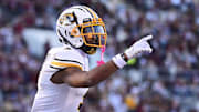 Nov 23, 2024; Starkville, Mississippi, USA; Missouri Tigers wide receiver Luther Burden III (3) reacts after a touchdown against the Mississippi State Bulldogs during the second quarter at Davis Wade Stadium at Scott Field. Mandatory Credit: Matt Bush-Imagn Images