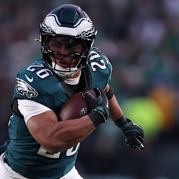 Philadelphia Eagles running back Saquon Barkley rushes the ball against the Green Bay Packers.