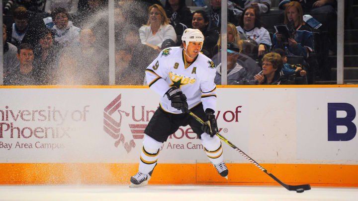 Mar. 3, 2009; San Jose, CA, USA; Dallas Stars center Mike Modano (9) controls the puck during the first period against the San Jose Sharks at HP Pavilion in San Jose, CA. The Stars defeated the Sharks 4-1. Mandatory Credit: Kyle Terada-USA TODAY Sports