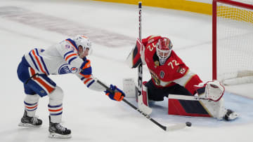 Edmonton Oilers forward Ryan Nugent-Hopkins (93) shoots the puck against Florida Panthers goaltender Sergei Bobrovsky (72)