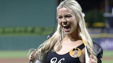 Now former Louisiana State University gymnast Lvivvy Dunn reacts on the field after her boyfriend Pittsburgh Pirates starting pitcher Paul Skenes (not pictured) made his major league debut.