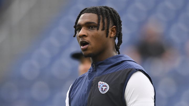  Dec 28, 2025; Nashville, Tennessee, USA;  Tennessee Titans quarterback Cam Ward (1) warms up prior to the game against the New Orleans Saints at Nissan Stadium. Mandatory Credit: Steve Roberts-Imagn Images