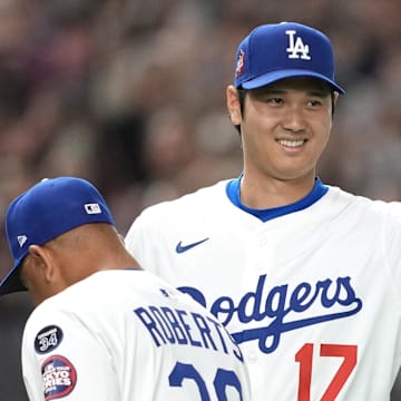 Mar 16, 2025; Bunkyo, Tokyo, Japan; Los Angeles Dodgers designated hitter Shohei Ohtani (17) gestures before the game against the Hanshin Tigers at Tokyo Dome. Mandatory Credit: Darren Yamashita-Imagn Images