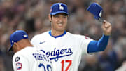  Los Angeles Dodgers designated hitter Shohei Ohtani gestures before the game against the Hanshin Tigers at Tokyo Dome. 