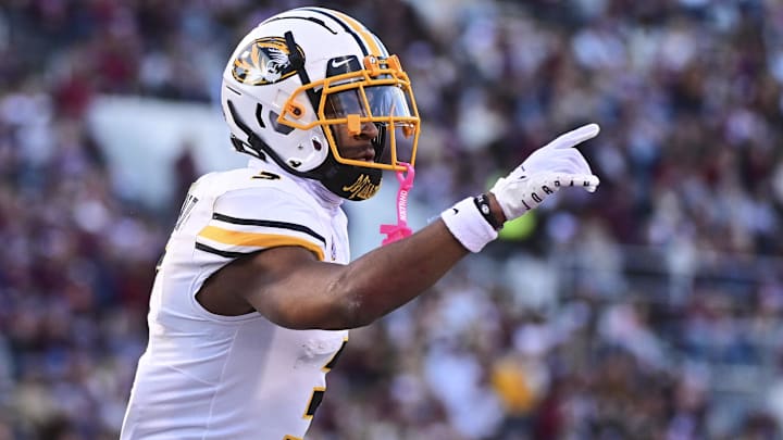 Nov 23, 2024; Starkville, Mississippi, USA; Missouri Tigers wide receiver Luther Burden III (3) reacts after a touchdown against the Mississippi State Bulldogs during the second quarter at Davis Wade Stadium at Scott Field. Mandatory Credit: Matt Bush-Imagn Images Nov 23, 2024; Starkville, Mississippi, USA; Missouri Tigers wide receiver Luther Burden III (3) reacts after a touchdown against the Mississippi State Bulldogs during the second quarter at Davis Wade Stadium at Scott Field. Mandatory Credit: Matt Bush-Imagn Images