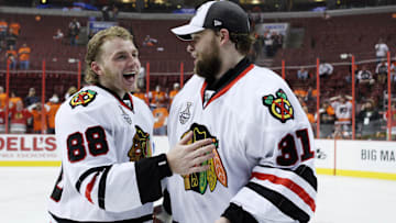 June 9, 2010; Philadelphia, PA, USA; Chicago Blackhawks right wing Patrick Kane (88) and goalie Antti Niemi (31) celebrate after defeating the Philadelphia Flyers 4-3 in game six of the 2010 Stanley Cup Finals at the Wachovia Center. Mandatory Credit: Ed Mulholland-Imagn Images