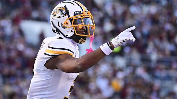 Nov 23, 2024; Starkville, Mississippi, USA; Missouri Tigers wide receiver Luther Burden III (3) reacts after a touchdown against the Mississippi State Bulldogs during the second quarter at Davis Wade Stadium at Scott Field. Mandatory Credit: Matt Bush-Imagn Images Nov 23, 2024; Starkville, Mississippi, USA; Missouri Tigers wide receiver Luther Burden III (3) reacts after a touchdown against the Mississippi State Bulldogs during the second quarter at Davis Wade Stadium at Scott Field. Mandatory Credit: Matt Bush-Imagn Images