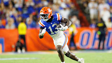 Oct 18, 2025; Gainesville, Florida, USA; Florida Gators running back Jadan Baugh (13) runs with the ball against the Mississippi State Bulldogs during the second half at Ben Hill Griffin Stadium. Mandatory Credit: Matt Pendleton-Imagn Images
