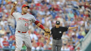 Aug 17, 2011; Washington, DC, USA; Cincinnati Reds third baseman Miguel Cairo (43) throws to first during the second inning against the Washington Nationals at Nationals Park. Mandatory Credit: Brad Mills-Imagn Images