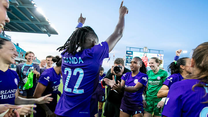 Orlando Pride forward Barbra Banda (22) celebrates with teammates after a momentous victory over the Kansas City Current at CPKC Stadium. Orlando Pride forward Barbra Banda (22) celebrates with teammates after a momentous victory over the Kansas City Current at CPKC Stadium.