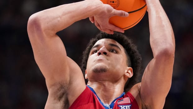 Mar 5, 2024; Lawrence, Kansas, USA; Kansas Jayhawks guard Kevin McCullar Jr. (15) shoots a free throw against the Kansas State Wildcats during the second half at Allen Fieldhouse. Mandatory Credit: Denny Medley-USA TODAY Sports