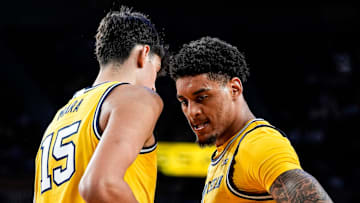 Michigan forward Yaxel Lendeborg (23) celebrates a play against Middle Tennessee with center Aday Mara (15) during the second half at Crisler Center in Ann Arbor on Wednesday, November 19, 2025.