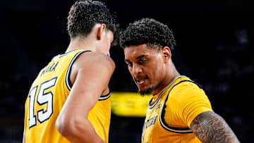 Michigan forward Yaxel Lendeborg (23) celebrates a play against Middle Tennessee with center Aday Mara (15) during the second half at Crisler Center in Ann Arbor on Wednesday, November 19, 2025.