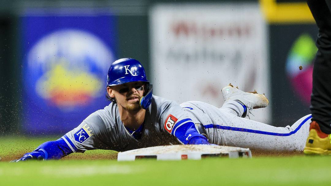 Aug 16, 2024; Cincinnati, Ohio, USA; Kansas City Royals shortstop Bobby Witt Jr. (7) steals third on a throwing error in the seventh inning against the Cincinnati Reds at Great American Ball Park. Mandatory Credit: Katie Stratman-Imagn Images Aug 16, 2024; Cincinnati, Ohio, USA; Kansas City Royals shortstop Bobby Witt Jr. (7) steals third on a throwing error in the seventh inning against the Cincinnati Reds at Great American Ball Park. Mandatory Credit: Katie Stratman-Imagn Images