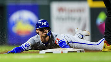 Aug 16, 2024; Cincinnati, Ohio, USA; Kansas City Royals shortstop Bobby Witt Jr. (7) steals third on a throwing error in the seventh inning against the Cincinnati Reds at Great American Ball Park. Mandatory Credit: Katie Stratman-Imagn Images