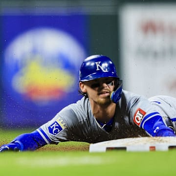 Aug 16, 2024; Cincinnati, Ohio, USA; Kansas City Royals shortstop Bobby Witt Jr. (7) steals third on a throwing error in the seventh inning against the Cincinnati Reds at Great American Ball Park. Mandatory Credit: Katie Stratman-Imagn Images