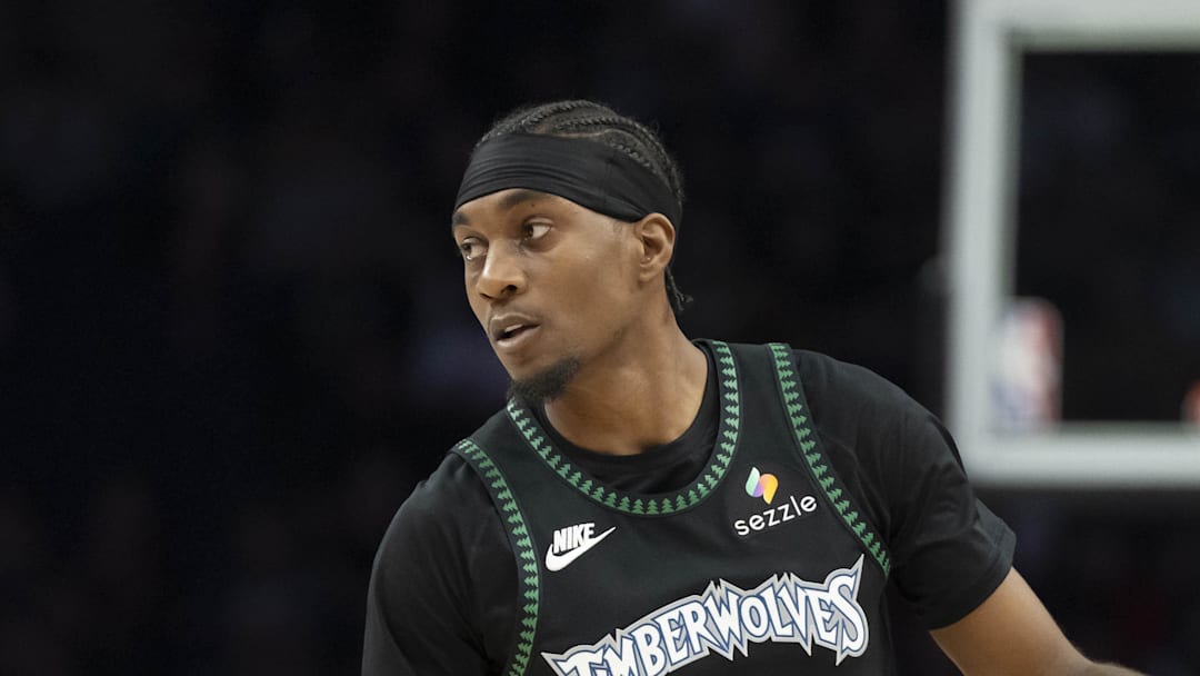 Mar 5, 2026; Minneapolis, Minnesota, USA; Minnesota Timberwolves forward Jaden McDaniels (3) dribbles the ball against the Toronto Raptors in the first half at Target Center. Mandatory Credit: Jesse Johnson-Imagn Images
