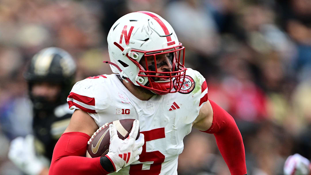 Nebraska Cornhuskers linebacker John Bullock (5) runs the ball for a touchdown after an interception against the Purdue Boilermakers