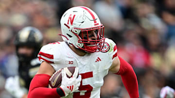 Nebraska Cornhuskers linebacker John Bullock (5) runs the ball for a touchdown after an interception against the Purdue Boilermakers