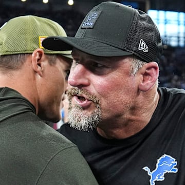 Detroit Lions head coach Dan Campbell hugs Minnesota Vikings head coach Kevin O'Connell after 27-24 loss 