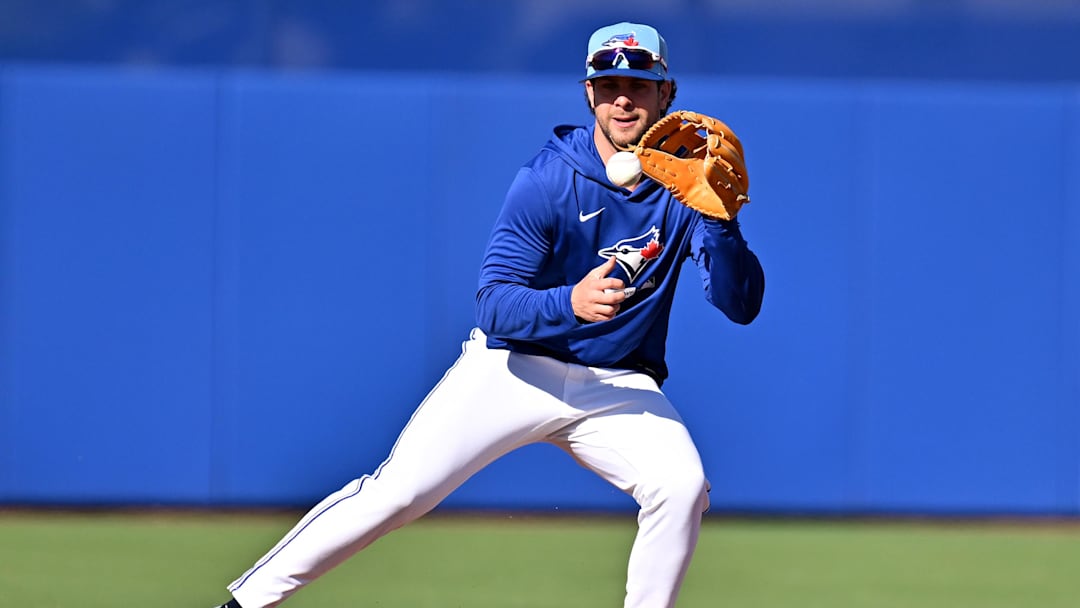  Blue Jays utility man Ernie Clement fields a ground ball during spring training at Bobby Mattick Training Center at Englebert Complex.