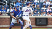 May 29, 2024; New York City, New York, USA;  New York Mets third base Brett Baty (22) hits a single in the third inning against the Los Angeles Dodgers at Citi Field. Mandatory Credit: Wendell Cruz-USA TODAY Sports