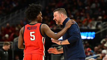 Mississippi Rebels head coach Chris Beard talks with Mississippi Rebels guard Jaylen Murray (5) during the first half in the second round of the NCAA Tournament against the Iowa State Cyclones at Fiserv Forum. 