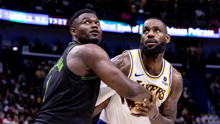 Apr 14, 2024; New Orleans, Louisiana, USA; Los Angeles Lakers forward LeBron James (23) and New Orleans Pelicans forward Zion Williamson (1) fight for position during the second half at Smoothie King Center. Mandatory Credit: Stephen Lew-USA TODAY Sports