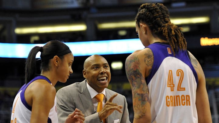 May 27, 2013; Phoenix, AZ, USA; Phoenix Mercury head coach Corey Gaines talks with forward Candice Dupree (4) and center Brittney Griner (42) during the second half against the Chicago Sky at US Airways Center. The Chicago Sky defeated the Phoenix Mercury 102-80. Mandatory Credit: Casey Sapio-Imagn Images