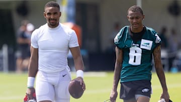 Jul 28, 2021; Philadelphia, PA, USA; Philadelphia Eagles quarterback Jalen Hurts (L) and wide receiver DeVonta Smith (6) walk together during training camp at NovaCare Complex. Mandatory Credit: Bill Streicher-Imagn Images