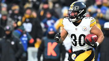 Jan 15, 2024; Orchard Park, New York, USA; Pittsburgh Steelers running back Jaylen Warren (30) runs