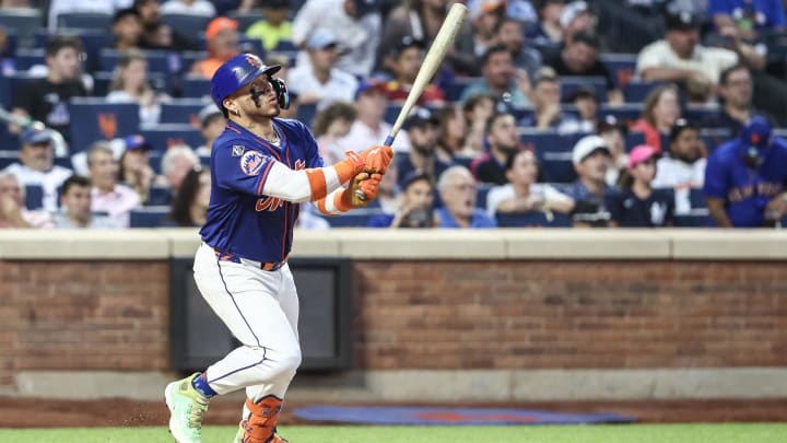 New York Mets catcher Francisco Alvarez (4) hits a two run home run in the third inning against the New York Yankees at Citi Field on June 26.