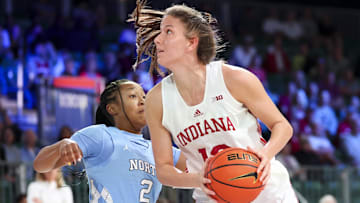 Indiana Hoosiers guard Yarden Garzon (12) looks to score as North Carolina Tar Heels guard Grace Townsend (2) defends during the first half at the Atlantis Resort.