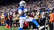 Detroit Lions wide receiver Jameson Williams (1) runs for a touchdown against Green Bay Packers 