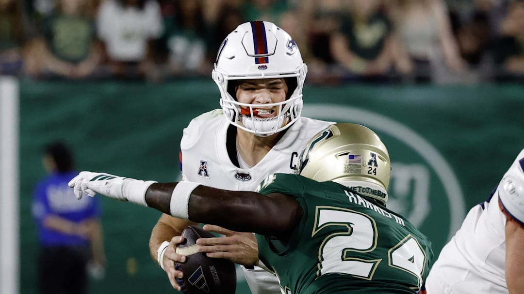 USF outside linebacker Mac Harris zeroes in on Florida Atlantic quarterback Caden Veltkamp in the Bulls' blowout win over the Owls. Harris was named the American Conference Defensive Player of the Week.