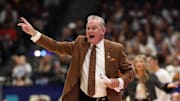 Apr 4, 2025; Tampa, FL, USA;  Texas Longhorns head coach Vic Schaefer reacts during the first quarter in a semifinal of the women's 2025 NCAA tournament at Amalie Arena. Mandatory Credit: Nathan Ray Seebeck-Imagn Images
