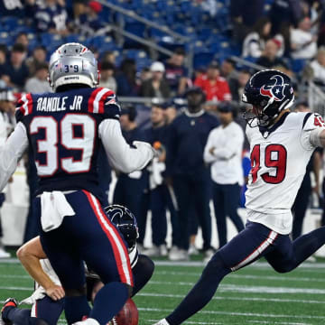 Aug 10, 2023; Foxborough, Massachusetts, USA; Houston Texans place kicker Jake Bates (49) kicks an extra point against the New England Patriots during the second half at Gillette Stadium. Mandatory Credit: Eric Canha-USA TODAY Sports