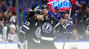 Dec 28, 2024; Tampa, Florida, USA; Tampa Bay Lightning left wing Nick Paul (20) celebrates with defenseman Victor Hedman (77) after he scored a goal against the New York Rangers during the third period at Amalie Arena. Mandatory Credit: Kim Klement Neitzel-Imagn Images