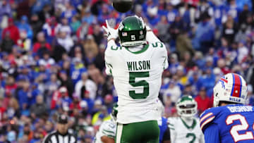 Dec 29, 2024; Orchard Park, New York, USA; New York Jets wide receiver Garrett Wilson (5) makes a catch against the Buffalo Bills during the second half at Highmark Stadium. Mandatory Credit: Gregory Fisher-Imagn Images
