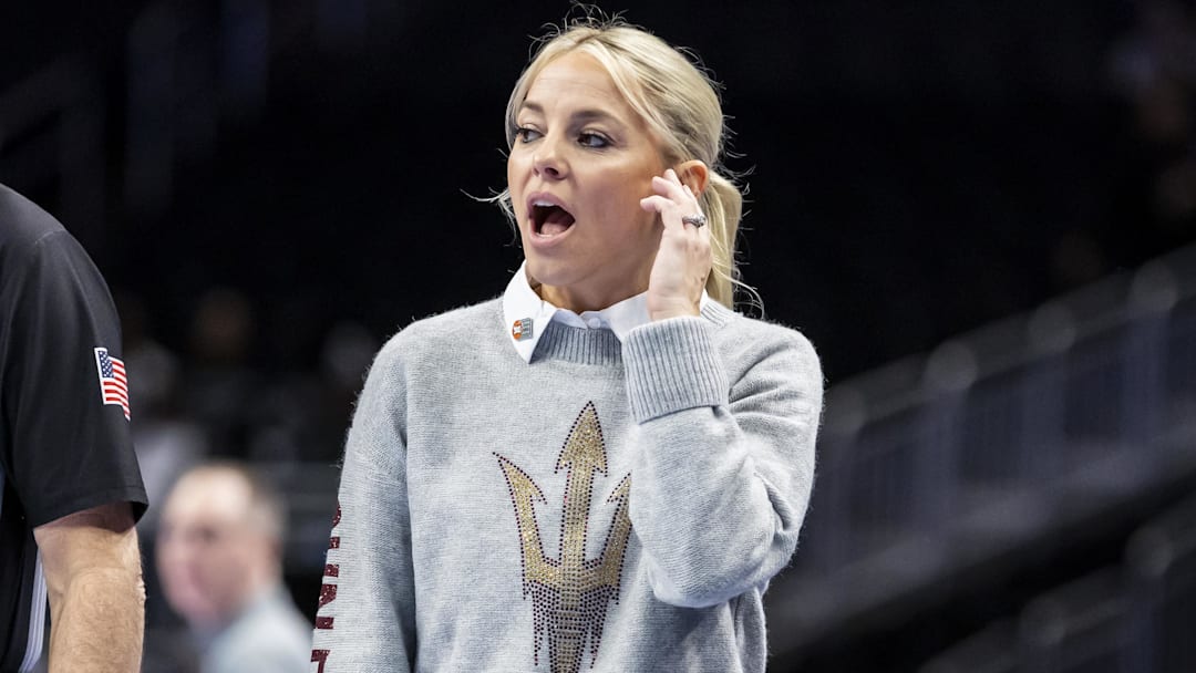 Mar 6, 2026; Kansas City, MO, USA; Arizona State head coach Molly Miller reacts to a play against West Virginia during the first half at T-Mobile Center. Mandatory Credit: Nick Tre. Smith-Imagn Images