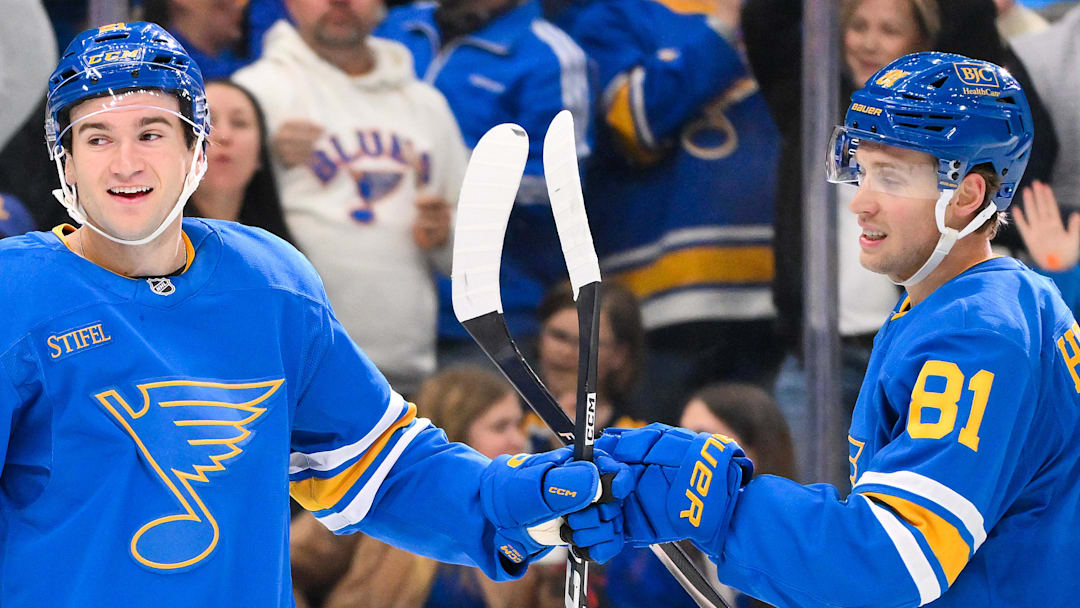 Mar 28, 2026; St. Louis, Missouri, USA; St. Louis Blues right wing Jimmy Snuggerud (21) is congratulated by left wing Dylan Holloway (81) after scoring against the Toronto Maple Leafs during the second period at Enterprise Center. Mandatory Credit: Jeff Curry-Imagn Images