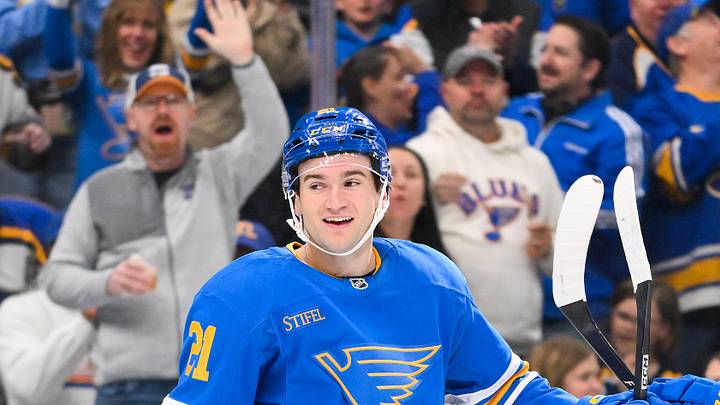 Mar 28, 2026; St. Louis, Missouri, USA; St. Louis Blues right wing Jimmy Snuggerud (21) is congratulated by left wing Dylan Holloway (81) after scoring against the Toronto Maple Leafs during the second period at Enterprise Center. Mandatory Credit: Jeff Curry-Imagn Images