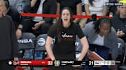 Clark reacts from the bench as the Indiana Fever play the Chicago Sky.