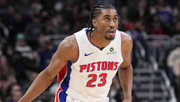 Detroit Pistons guard Jaden Ivey (23) pushes the ball up the court against the Milwaukee Bucks in the second half at Fiserv Forum.